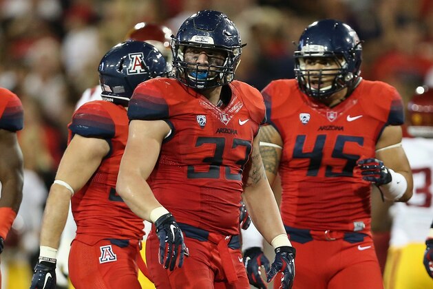 TUCSON, AZ - OCTOBER 11:  Linebacker Scooby Wright III #33 of the Arizona Wildcats during the college football game against the USC Trojans at Arizona Stadium on October 11, 2014 in Tucson, Arizona. The Trojans defeatred the Wildcats 28-26.  (Photo by Christian Petersen/Getty Images)