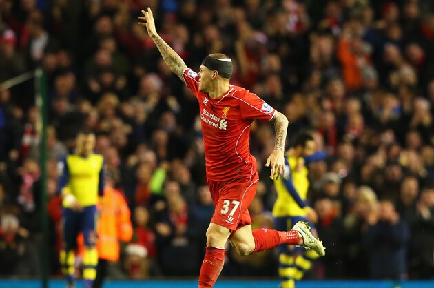 LIVERPOOL, ENGLAND - DECEMBER 21:  Martin Skrtel of Liverpool celebrates scoring his goal during the Barclays Premier League match between Liverpool and Arsenal at Anfield on December 21, 2014 in Liverpool, England.  (Photo by Alex Livesey/Getty Images)