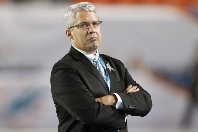 MIAMI GARDENS, FL - NOVEMBER 13:  General Manager Dennis Hickey of the Miami Dolphins looks on during pregame workouts before the Dolphins met the Buffalo Bills in a game at Sun Life Stadium on November 13, 2014 in Miami Gardens, Florida.  (Photo by Joel Auerbach/Getty Images)