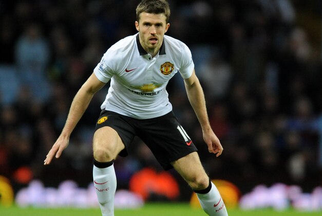 Manchester United's Michael Carrick during the English Premier League soccer match between Aston Villa and Manchester United at Villa Park, in  Birmingham, England, Saturday, Dec. 20, 2014.  (AP Photo/Rui Vieira)