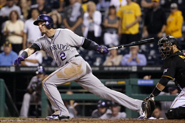 Colorado Rockies' Troy Tulowitzki  (2) grounds out to third base for the final out of a 4-2 loss to the Pittsburgh Pirates' during the ninth inning of a baseball game in Pittsburgh Friday, July 18, 2014. (AP Photo/Gene J. Puskar)