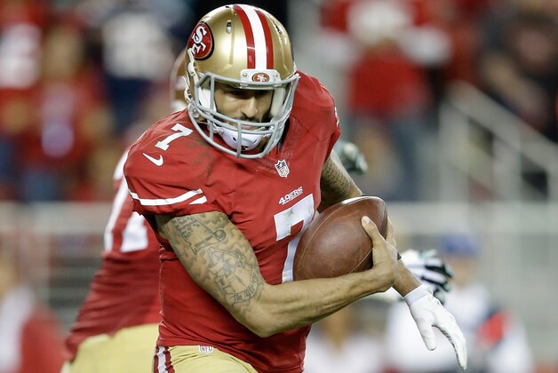 SANTA CLARA, CA - DECEMBER 20:  Quarterback Colin Kaepernick #7 of the San Francisco 49ers runs the ball for a 90-yard touchdown in the second half against the San Diego Chargers at Levi's Stadium on December 20, 2014 in Santa Clara, California.  (Photo by Ezra Shaw/Getty Images)