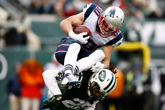 EAST RUTHERFORD, NJ - DECEMBER 21:  Wide receiver Danny Amendola #80 of the New England Patriots is tackled by free safety Calvin Pryor #25 of the New York Jets in the first quarter during a game at MetLife Stadium on December 21, 2014 in East Rutherford, New Jersey.  (Photo by Jeff Zelevansky/Getty Images)