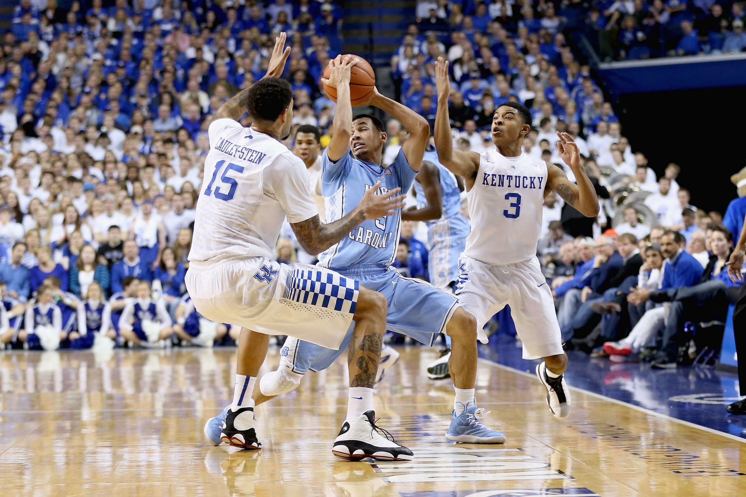 LEXINGTON, KY - DECEMBER 13:  Willie Cauley-Stein #15 and Tyler Ulis #3 of the Kentucky Wildcats defend Marcus Paige #5 of the  North Carolina Tar Heels during the game at Rupp Arena on December 13, 2014 in Lexington, Kentucky.  (Photo by Andy Lyons/Getty Images)