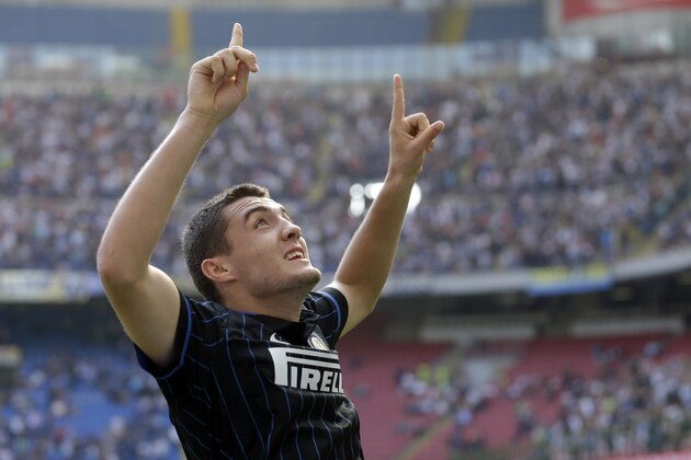 Inter Milan midfielder Mateo Kovacic, of Croatia, celebrates after scoring during a Serie A soccer match between Inter Milan and Sassuolo, at the San Siro stadium in Milan, Italy, Sunday, Sept.14, 2014. (AP Photo/Luca Bruno)