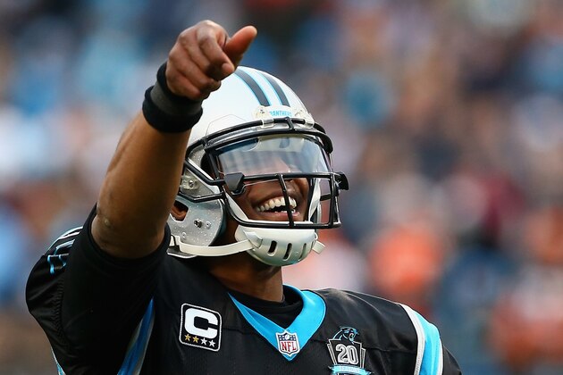 CHARLOTTE, NC - DECEMBER 21:  Cam Newton #1 of the Carolina Panthers begins celebrating victory against the Cleveland Browns with time still on the clock, gesturing for the crowd to 'turn up' at Bank of America Stadium on December 21, 2014 in Charlotte, North Carolina.  (Photo by Streeter Lecka/Getty Images)