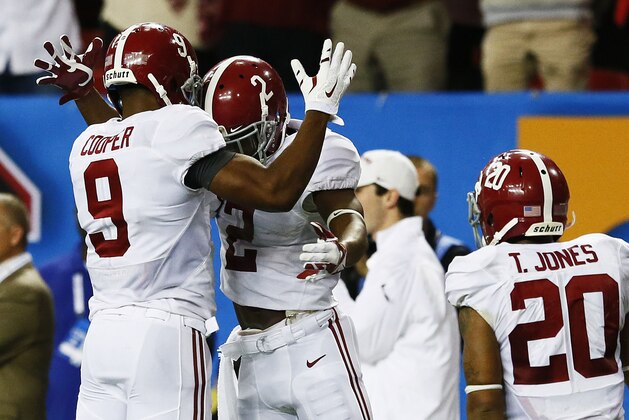 ATLANTA, GA - DECEMBER 06:  DeAndrew White #2 of the Alabama Crimson Tide celebrates with teammate Amari Cooper #9 after completing a reception for a touchdown against the Missouri Tigers in the second quarter of the SEC Championship game at the Georgia Dome on December 6, 2014 in Atlanta, Georgia.  (Photo by Kevin C. Cox/Getty Images)