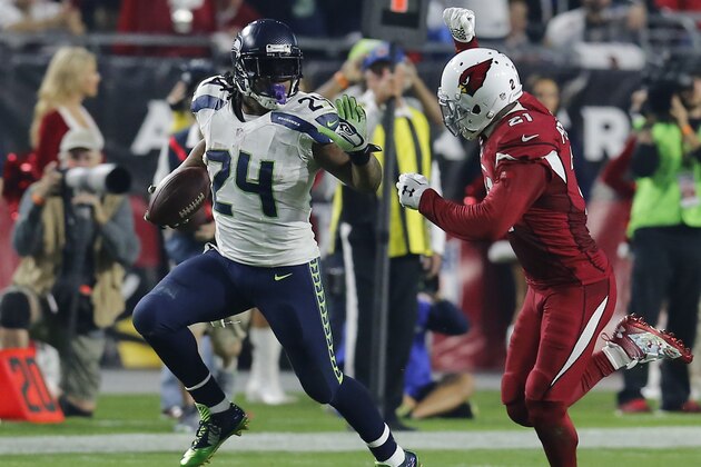 Seattle Seahawks running back Marshawn Lynch (24) during the first quarter of an NFL football game against the Arizona Cardinals, Sunday, Dec. 21, 2014 in Glendale, Ariz. (AP Photo/Rick Scuteri)