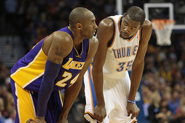 OKLAHOMA CITY, OK - DECEMBER 07:  Kevin Durant #35 of the Oklahoma City Thunder looks at Kobe Bryant #24 of the Los Angeles Lakers December 7, 2012 at Chesapeake Energy Arena in Oklahoma City, Oklahoma. Oklahoma City defeated Los Angeles 114-108. NOTE TO USER: User expressly acknowledges and agrees that, by downloading and or using this photograph, User is consenting to the terms and conditions of the Getty Images License Agreement.   (Photo by Brett Deering/Getty Images)