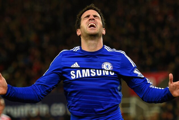 STOKE ON TRENT, ENGLAND - DECEMBER 22:  Cesc Fabregas of Chelsea celebrates as he scores their second goal during the Barclays Premier League match between Stoke City and Chelsea at Britannia Stadium on December 22, 2014 in Stoke on Trent, England.  (Photo by Michael Regan/Getty Images)