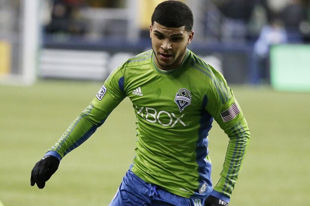 Seattle Sounders defender DeAndre Yedlin moves the ball against the Los Angeles Galaxy during the second leg of the MLS soccer western conference final, Sunday, Nov. 30, 2014, in Seattle. (AP Photo/Ted S. Warren)