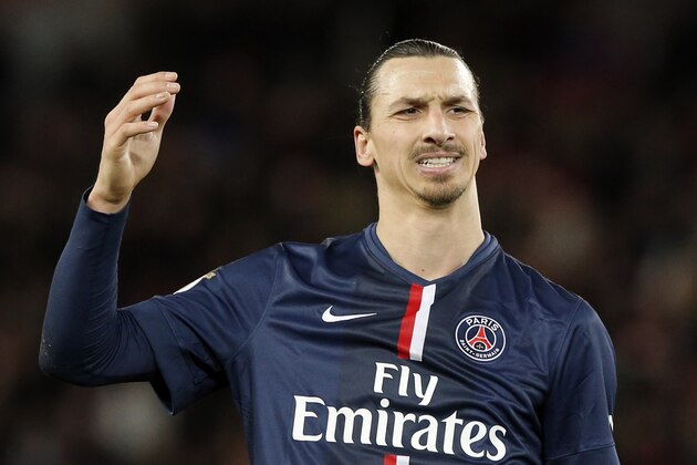 Paris Saint Germain's Zlatan Ibrahimovic gestures,  during their League One soccer match between Paris Saint Germain and Montpellier,  at Parc des Princes stadium, in Paris, Saturday, Dec. 20, 2014. (AP Photo/Francois Mori)