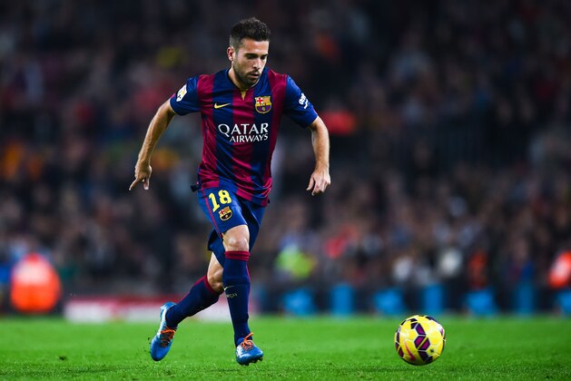 BARCELONA, SPAIN - NOVEMBER 22:  Jordi Alba of FC Barcelona runs with the ball during the La Liga mach between FC Barcelona and Sevilla FC at Camp Nou on November 22, 2014 in Barcelona, Spain.  (Photo by David Ramos/Getty Images)