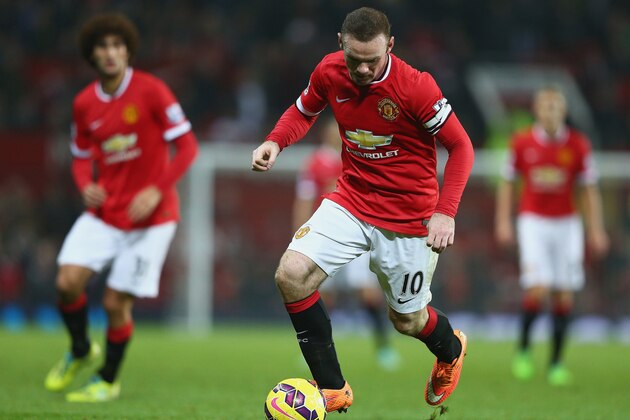 MANCHESTER, ENGLAND - NOVEMBER 29:  Wayne Rooney of Manchester United in action during the Barclays Premier League match between Manchester United and Hull City at Old Trafford on November 29, 2014 in Manchester, England.  (Photo by Clive Mason/Getty Images)