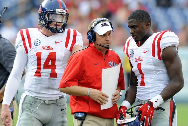 Sep 6, 2014; Nashville, TN, USA; Mississippi Rebels head coach Hugh Freeze talks with receiver Laquon Treadwell (1) during the second half against the Vanderbilt Commodores at LP Field. Mississippi won 41-3. Mandatory Credit: Christopher Hanewinckel-USA TODAY Sports