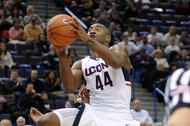 Connecticut's Rodney Purvis (44) drives during Connecticut's 106-85 victory over Coppin State in an NCAA college basketball game in Hartford, Conn., on Sunday, Dec. 14, 2014. (AP Photo/Fred Beckham)