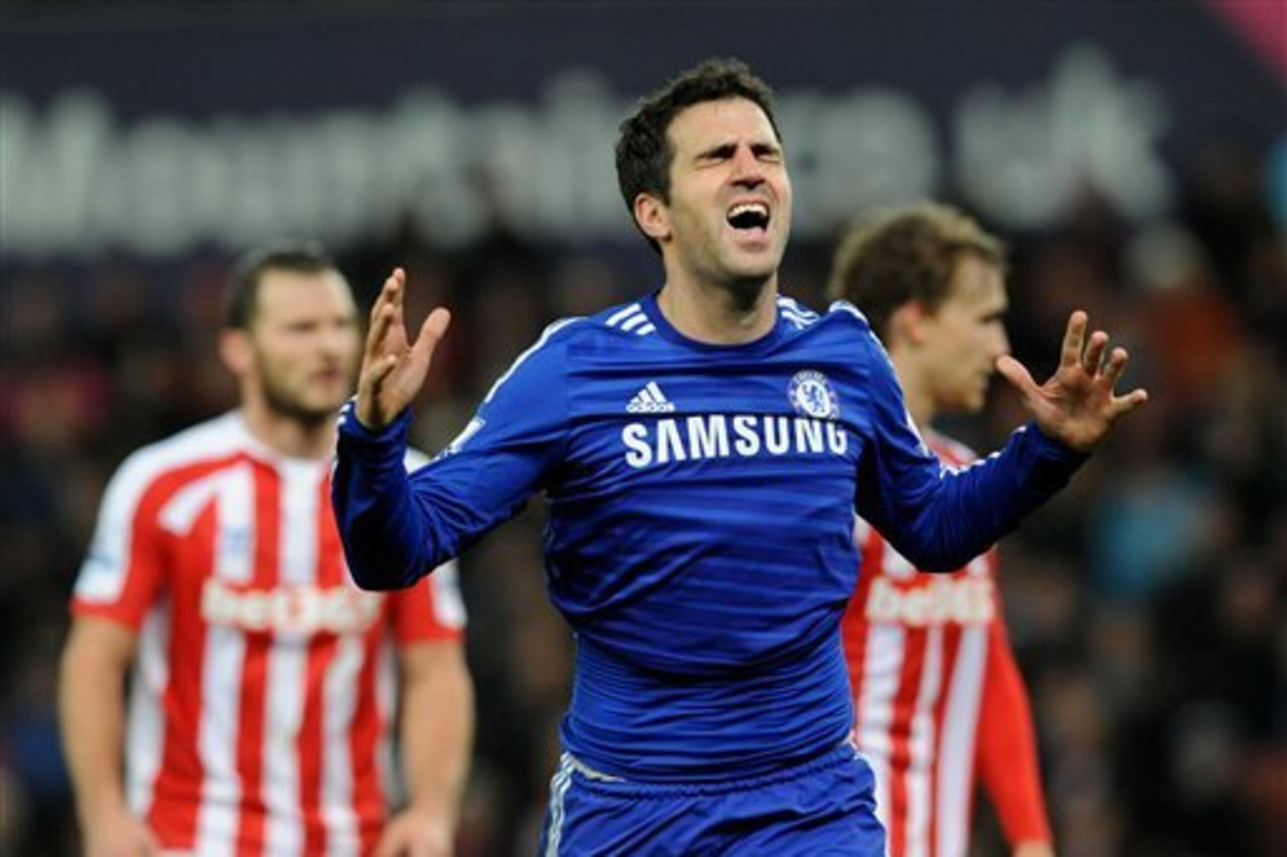 Chelsea's Cesc Fabregas celebrates after scoring against Stoke during the English Premier League soccer match between Stoke City and Chelsea at the Britannia Stadium, in Stoke on Trent, England, Monday, Dec. 22, 2014. (AP Photo/Rui Vieira) Chelsea's Cesc Fabregas celebrates after scoring against Stoke during the English Premier League soccer match between Stoke City and Chelsea at the Britannia Stadium, in Stoke on Trent, England, Monday, Dec. 22, 2014. (AP Photo/Rui Vieira)