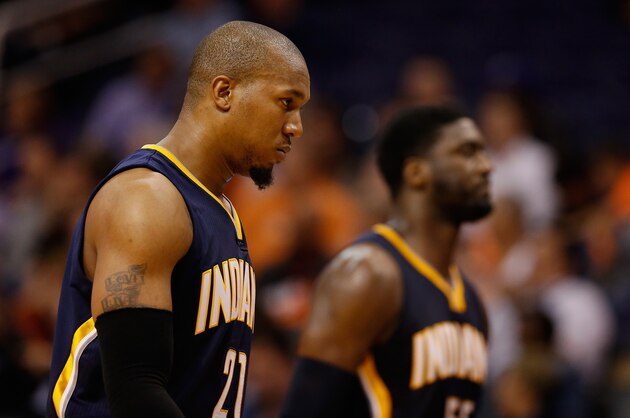 PHOENIX, AZ - DECEMBER 02:  David West #21 and Roy Hibbert #55 of the Indiana Pacers check out of the NBA game late in the fourth quarter against the Phoenix Suns at US Airways Center on December 2, 2014 in Phoenix, Arizona.  NOTE TO USER: User expressly acknowledges and agrees that, by downloading and or using this photograph, User is consenting to the terms and conditions of the Getty Images License Agreement. The Suns defeated the Pacers 116-99.  (Photo by Christian Petersen/Getty Images)