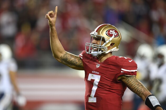 SANTA CLARA, CA - DECEMBER 20:  Colin Kaepernick #7 of the San Francisco 49ers celebrate after a 90 yard touchdown in the third quarter against the San Diego Chargers at Levi's Stadium on December 20, 2014 in Santa Clara, California.  (Photo by Thearon W. Henderson/Getty Images)
