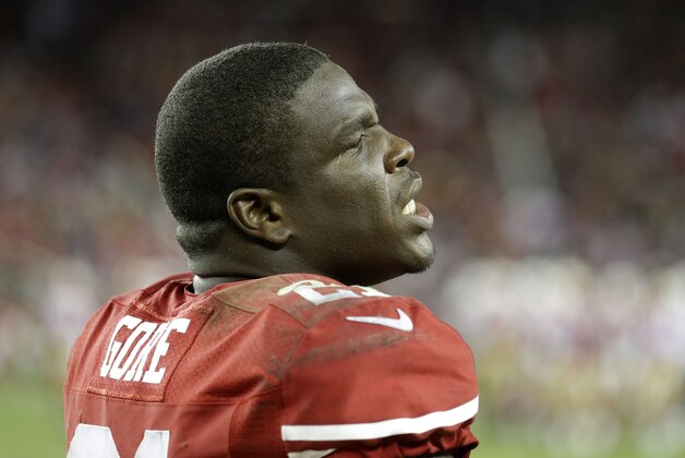 San Francisco 49ers running back Frank Gore (21) stands on the sideline during the fourth quarter of an NFL football game against the San Diego Chargers in Santa Clara, Calif., Saturday, Dec. 20, 2014. (AP Photo/Ben Margot)