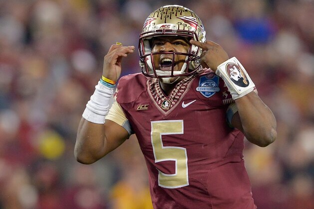 CHARLOTTE, NC - DECEMBER 06:  Jameis Winston #5 of the Florida State Seminoles calls an audible against the Georgia Tech Yellow Jackets during the Atlantic Coast Conference championship game on December 6, 2014 in Greenville, North Carolina. Florida State won 37-35.  (Photo by Grant Halverson/Getty Images)