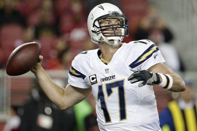 San Diego Chargers quarterback Philip Rivers (17) passes against the San Francisco 49ers during the first quarter of an NFL football game in Santa Clara, Calif., Saturday, Dec. 20, 2014. (AP Photo/Marcio Jose Sanchez)
