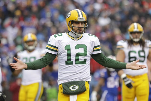 Green Bay Packers quarterback Aaron Rodgers (12) reacts to a call during the first half of an NFL football gameagainst the Buffalo Bills Sunday, Dec. 14, 2014, in Orchard Park, N.Y. (AP Photo/Bill Wippert)