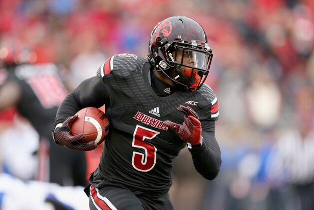 LOUISVILLE, KY - NOVEMBER 29:  Michael Dyer #5 of the Louisville Cardinals runs with the ball during the game against the Kentucky Wildcats at Papa John's Cardinal Stadium on November 29, 2014 in Louisville, Kentucky.  (Photo by Andy Lyons/Getty Images)
