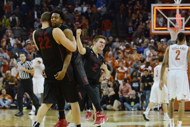 Dec 23, 2014; Austin, TX, USA; Stanford Cardinal guards Robert Cartwright (2) and Chasson Randle (center) and forward Reid Travis (22) react after the game against the Texas Longhorns at the Frank Erwin Special Events Center. Stanford beat Texas 74-71. Mandatory Credit: Brendan Maloney-USA TODAY Sports