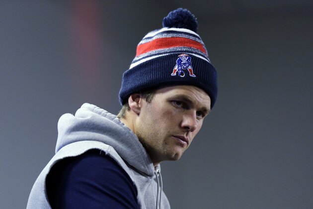 New England Patriots quarterback Tom Brady prior to an NFL football practice in Foxborough, Mass., Tuesday, Dec. 23, 2014. (AP Photo/Charles Krupa)