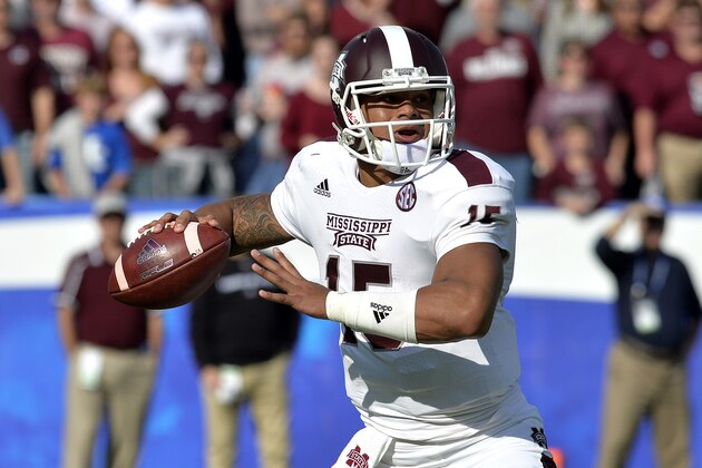 Mississippi State quarterback Dak Prescott attempts a pass during the first quarter of an NCAA college football game at Commonwealth Stadium in Lexington, Ky., Saturday, Oct. 25, 2014. (AP Photo/Timothy D. Easley)