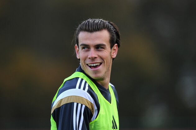 CARDIFF, WALES - NOVEMBER 15:  Wales player Gareth Bale raises a smile during Wales football training ahead of tomorrow's UEFA Euro 2016 qualifying match against Belguim on November 15, 2014 in Cardiff, Wales.  (Photo by Stu Forster/Getty Images)