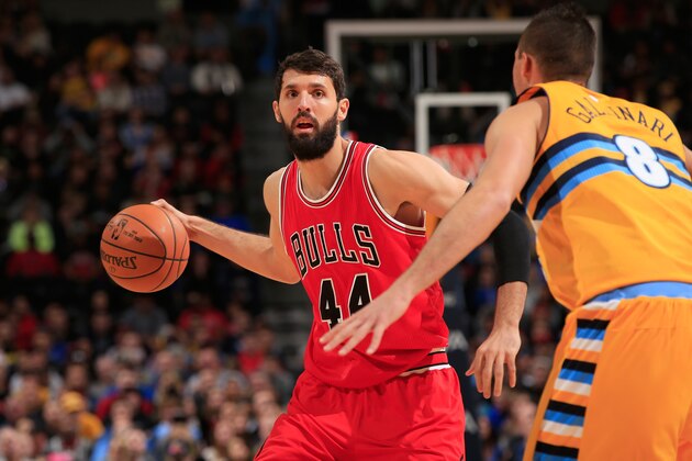 DENVER, CO - NOVEMBER 25: Nikola Mirotic #44 of the Chicago Bulls controls the ball against Danilo Gallinari #8 of the Denver Nuggets at Pepsi Center on November 25, 2014 in Denver, Colorado. The Nuggets defeated the Bulls 114-109. NOTE TO USER: User expressly acknowledges and agrees that, by downloading and or using this photograph, User is consenting to the terms and conditions of the Getty Images License Agreement. (Photo by Doug Pensinger/Getty Images) DENVER, CO - NOVEMBER 25: Nikola Mirotic #44 of the Chicago Bulls controls the ball against Danilo Gallinari #8 of the Denver Nuggets at Pepsi Center on November 25, 2014 in Denver, Colorado. The Nuggets defeated the Bulls 114-109. NOTE TO USER: User expressly acknowledges and agrees that, by downloading and or using this photograph, User is consenting to the terms and conditions of the Getty Images License Agreement. (Photo by Doug Pensinger/Getty Images)