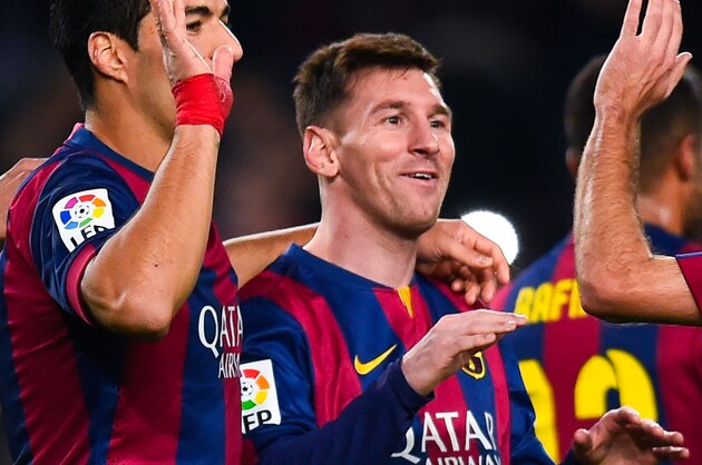 BARCELONA, SPAIN - DECEMBER 20:  Lionel Messi of FC Barcelona celebrates with his teammates after scoring his team's fifth goalduring the La Liga match between FC Barcelona and Cordoba CF at Camp Nou on December 20, 2014 in Barcelona, Spain.  (Photo by David Ramos/Getty Images)