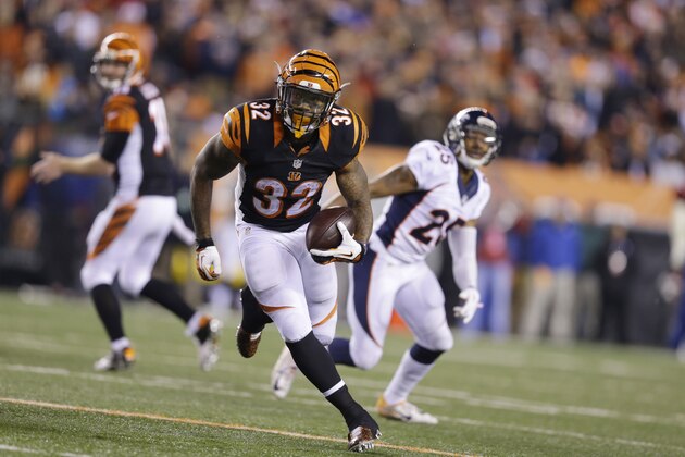 Cincinnati Bengals running back Jeremy Hill (32) runs against the Denver Broncos during the second half of an NFL football game Monday, Dec. 22, 2014, in Cincinnati. (AP Photo/Michael Conroy)