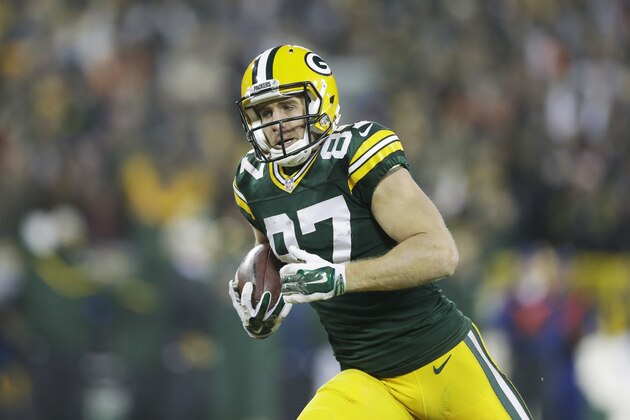Green Bay Packers' Jordy Nelson catches a 60-yard touchdown pass during the second half of an NFL football game against the Atlanta Falcons Monday, Dec. 8, 2014, in Green Bay, Wis. (AP Photo/Tom Lynn)