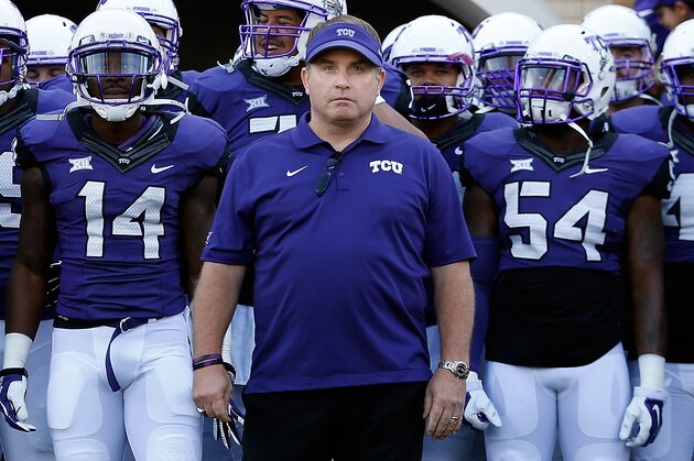 FORT WORTH, TX - DECEMBER 06:  Head coach Gary Patterson of the TCU Horned Frogs leads his team onto the field before the Big 12 college football game against the Iowa State Cyclones at Amon G. Carter Stadium on December 6, 2014 in Fort Worth, Texas. The Horned Frongs defeated the Cyclones 55-3. (Photo by Christian Petersen/Getty Images)