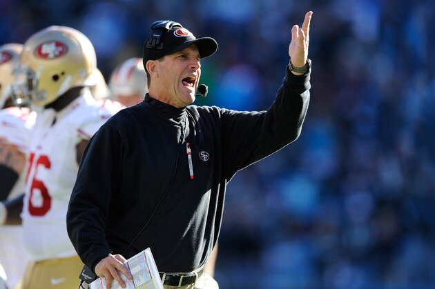 CHARLOTTE, NC - JANUARY 12:  Head coach Jim Harbaugh of the San Francisco 49ers looks on in the second quarter against the Carolina Panthers during the NFC Divisional Playoff Game at Bank of America Stadium on January 12, 2014 in Charlotte, North Carolina.  (Photo by Grant Halverson/Getty Images)