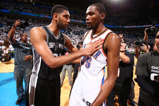 OKLAHOMA CITY, OK - MAY 31: Tim Duncan #21 of the San Antonio Spurs and Kevin Durant #35 of the Oklahoma City Thunder after Game 6 of the Western Conference Finals during the 2014 NBA playoffs at Chesapeake Energy Arena on may 31, 2014 in Oklahoma City, Oklahoma. NOTE TO USER: User expressly acknowledges and agrees that, by downloading and/or using this photograph, user is consenting to the terms and conditions of the Getty Images License Agreement.  Mandatory Copyright Notice: Copyright 2014 NBAE (Photo by Nathaniel S. Butler/NBAE via Getty Images)