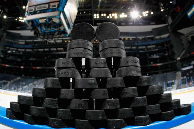 ATLANTA, GA - DECEMBER 16:  A stack of practice pucks sit on the boards before warmups for the Atlanta Thrashers and the Carolina Hurricanes at Philips Arena on December 16, 2010 in Atlanta, Georgia.  (Photo by Kevin C. Cox/Getty Images)