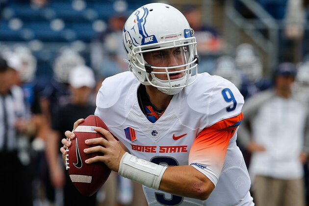 BOSTON, MA - SEPTEMBER 13:   Grant Hedrick #9 of the Boise State Broncos looks for an open man against the Connecticut Huskies  in the first quarter at Rentschler Field on September 13, 2014 in East Hartford, Connecticut. (Photo by Jim Rogash/Getty Images)