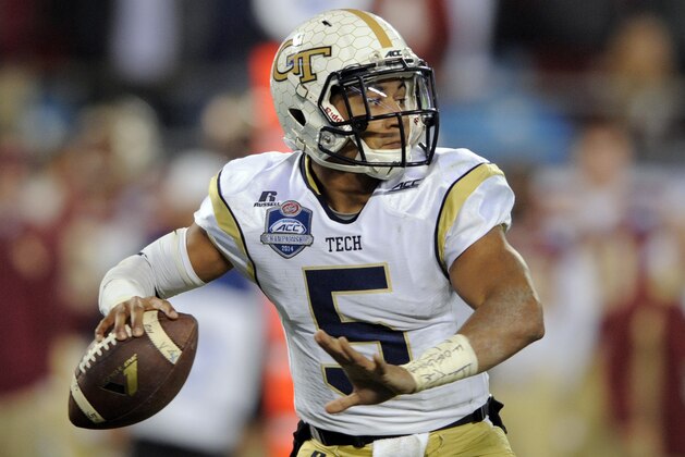 Georgia Tech quarterback Justin Thomas looks to pass against Florida State during the first half of the Atlantic Coast Conference championship NCAA college football game in Charlotte, N.C., Saturday, Dec. 6, 2014. (AP Photo/Mike McCarn)