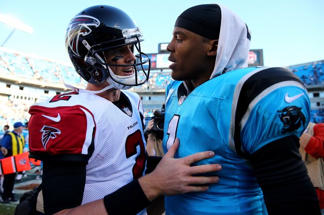 CHARLOTTE, NC - NOVEMBER 03:  Cam Newton #1 of the Carolina Panthers talks to Matt Ryan #2 of the Atlanta Falcons after defeating the Falcons 34-10 at Bank of America Stadium on November 3, 2013 in Charlotte, North Carolina.  (Photo by Streeter Lecka/Getty Images)