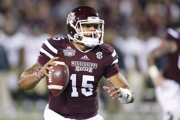 Mississippi State quarterback Dak Prescott looks for an open receiver in the first half of an NCAA college football game against Vanderbilt on Saturday, Nov. 22, 2014, in Starkville, Miss. No. 4 Mississippi State won 51-0. (AP Photo/Rogelio V. Solis)