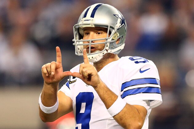 ARLINGTON, TX - DECEMBER 21:  Tony Romo #9 of the Dallas Cowboys directs the offense against the Indianapolis Colts in the first half at AT&T Stadium on December 21, 2014 in Arlington, Texas.  (Photo by Ronald Martinez/Getty Images)