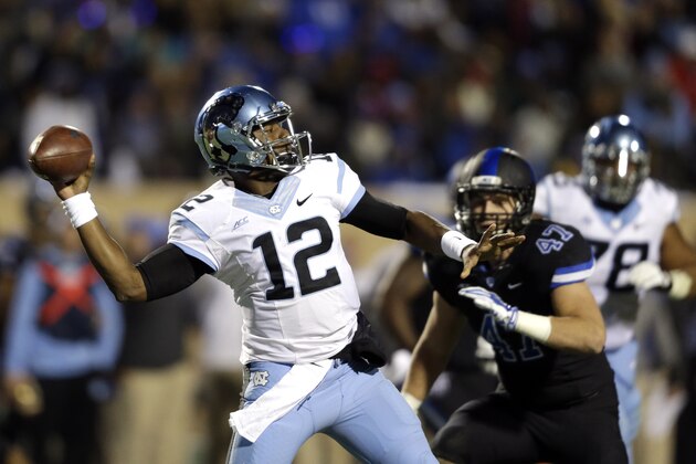 North Carolina quarterback Marquise Williams passes during the first half of an NCAA college football game against Duke in Durham, N.C., Thursday, Nov. 20, 2014. (AP Photo/Gerry Broome)
