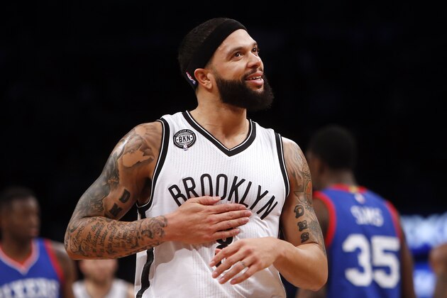 Brooklyn Nets' Deron Williams is seen during the first quarter of an NBA basketball game against the Philadelphia 76ers Friday, Dec. 12, 2014, in New York.  Brooklyn beat Philadelphia 88-70. (AP Photo/Jason DeCrow)
