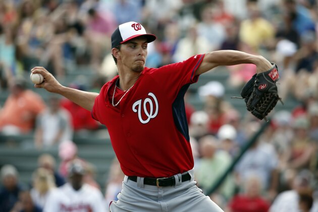 Washington Nationals starting pitcher A.J. Cole (69) throws in a spring exhibition baseball game against the Atlanta Braves, Tuesday, March 4, 2014, in Kissimmee, Fla. The Braves won 8-4. (AP Photo/Alex Brandon)