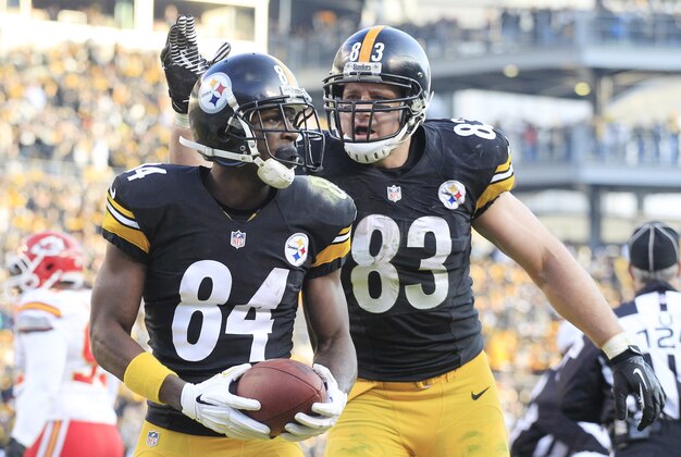 Dec 21, 2014; Pittsburgh, PA, USA; Pittsburgh Steelers wide receiver Antonio Brown (84) and tight end Heath Miller (83) celebrate after Brown scored a touchdown against the Kansas City Chiefs during the third quarter at Heinz Field. The Steelers won 20-12. Mandatory Credit: Charles LeClaire-USA TODAY Sports