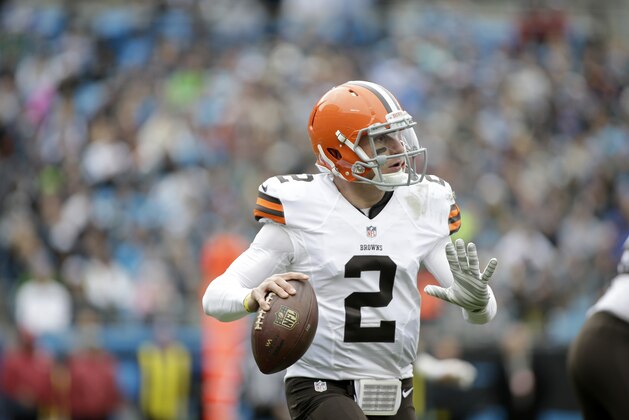 Cleveland Browns' Johnny Manziel (2) scrambles out of the pocket as he looks to extend a play against the Carolina Panthers during the first half of an NFL football game in Charlotte, N.C., Sunday, Dec. 21, 2014. The Panthers won 17-13. (AP Photo/Bob Leverone) Cleveland Browns' Johnny Manziel (2) scrambles out of the pocket as he looks to extend a play against the Carolina Panthers during the first half of an NFL football game in Charlotte, N.C., Sunday, Dec. 21, 2014. The Panthers won 17-13. (AP Photo/Bob Leverone)